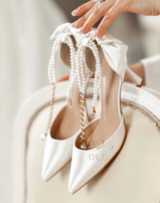 Туфлі з перлами і бантиком