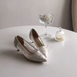 Мереживні туфлі з округленим підбором