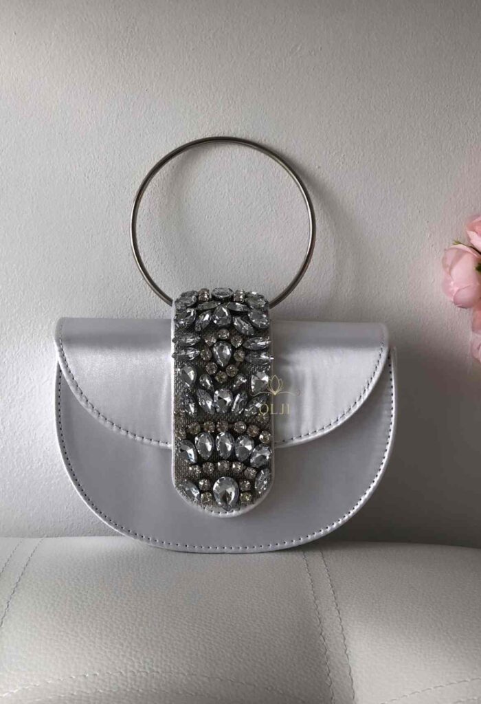 Сумка з срібною брошкою та круглою ручкою