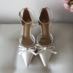 Атласні туфлі з бантом, стразами і мереживом